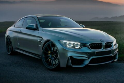 gray mercedes benz coupe on black asphalt road during daytime