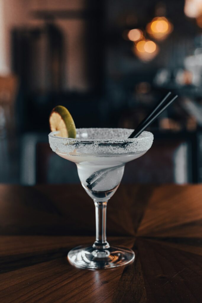 a glass with a drink in it