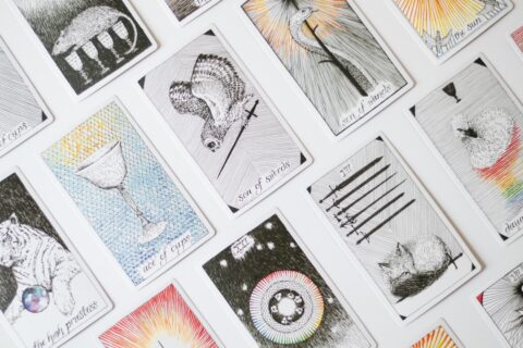A bunch of cards that are on a table